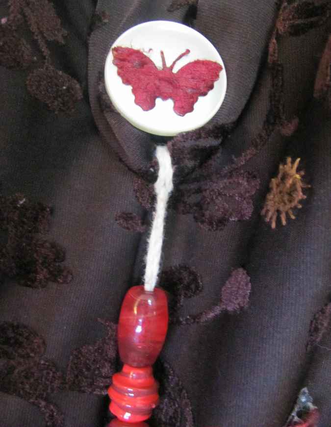 large image of art item: bag – brown motif flower black butterfly red