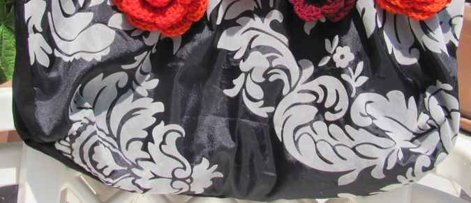 large image of art item: bag – black motif plant white flower crochet red