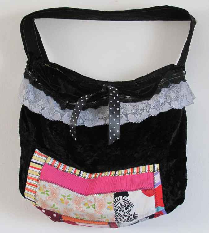 large image of art item: bag – black with white lace pink quiltwork and black and white ribbon