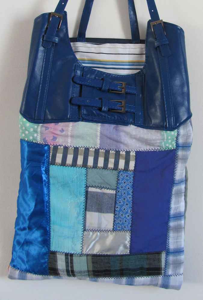 large image of art item: bag – blue quiltwork leathery top blue with buckles