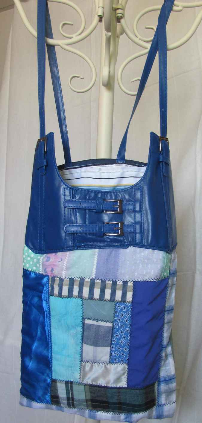 large image of art item: bag – blue quiltwork leathery top blue with buckles
