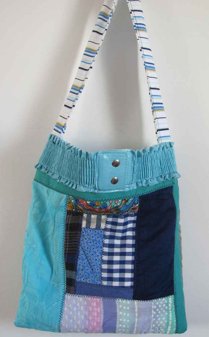 large image of art item: bag – blue quiltwork leathery top cyan