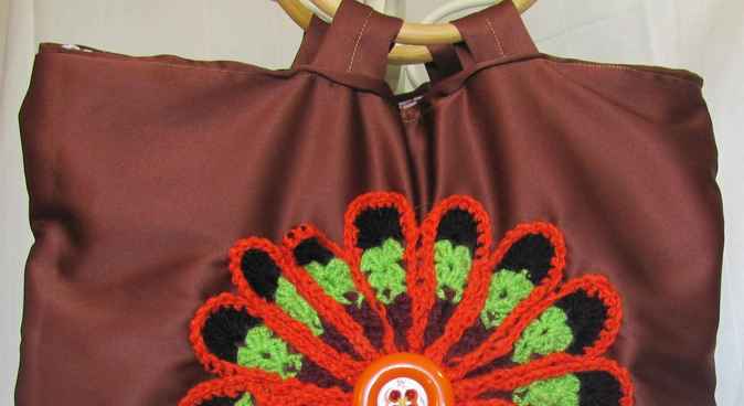 large image of art item: bag – brown crochet flower orange black green button orange