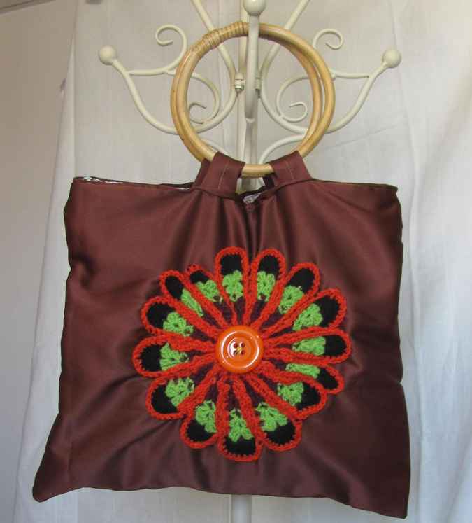 large image of art item: bag – brown crochet flower orange black green button orange