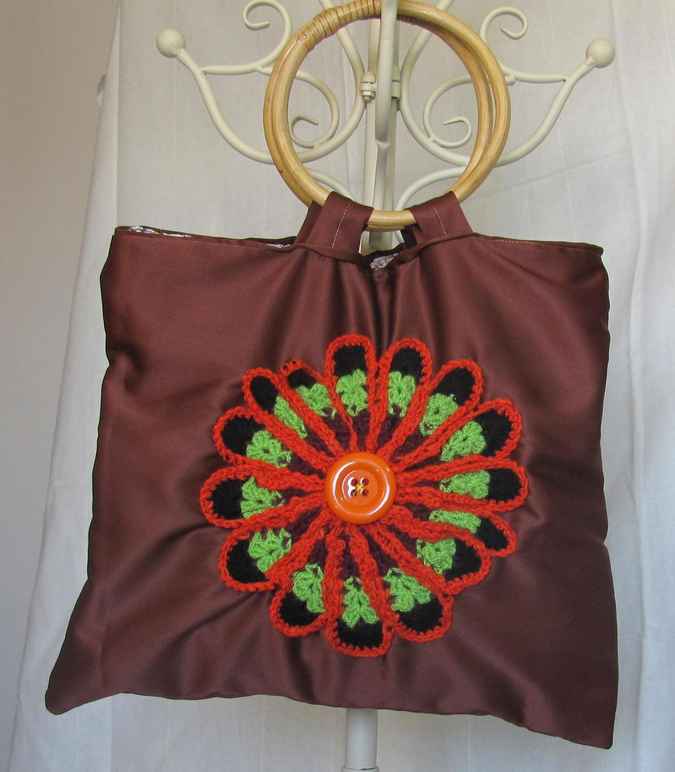 large image of art item: bag – brown crochet flower orange black green button orange