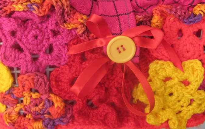 large image of art item: bag – checkered pink crochet flowers red yellow