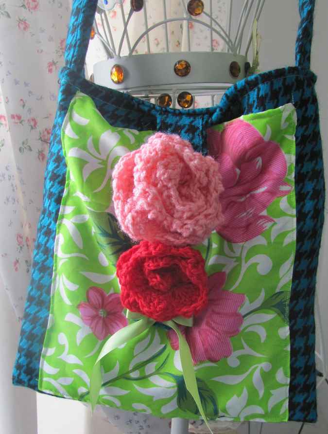 large image of art item: bag – checkred blue black motif leaves green white crochet flowers red pink