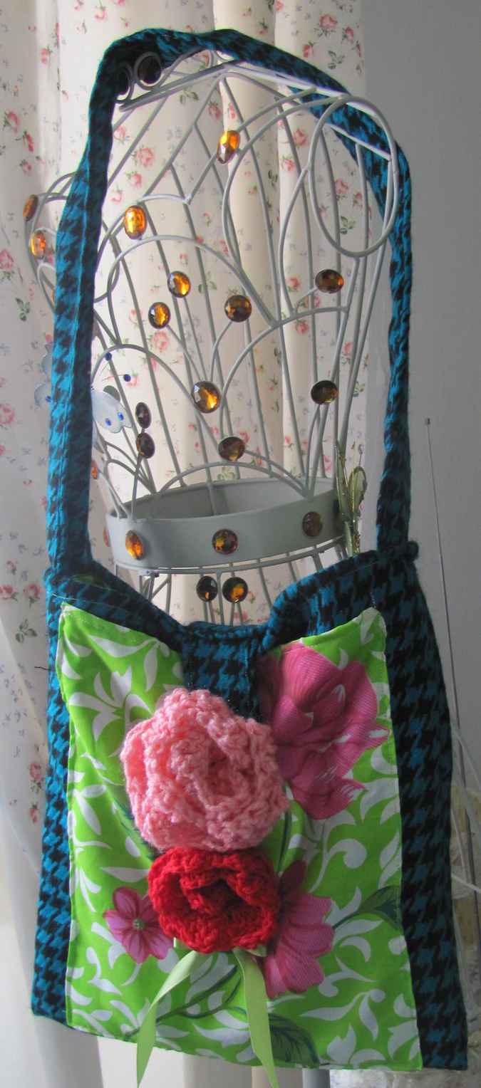 large image of art item: bag – checkred blue black motif leaves green white crochet flowers red pink