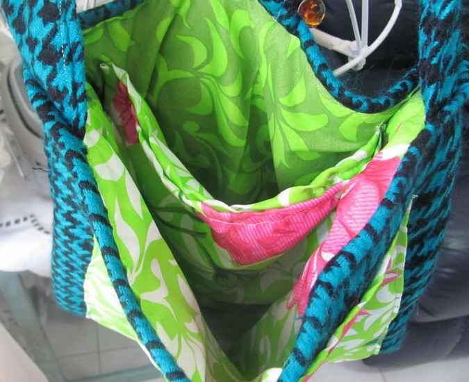 large image of art item: bag – checkred blue black motif leaves green white crochet flowers red pink