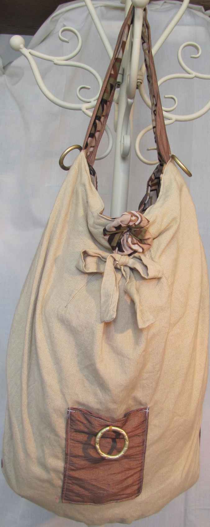 large image of art item: bag – cream brown with ring