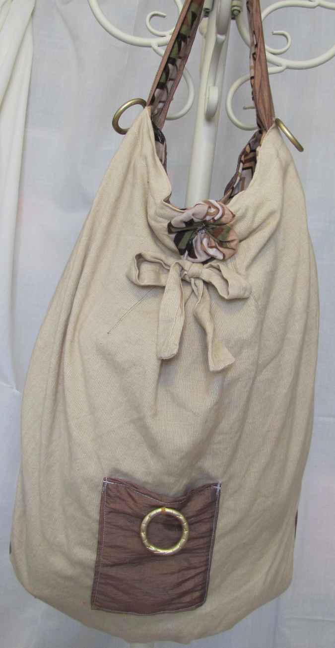 large image of art item: bag – cream brown with ring