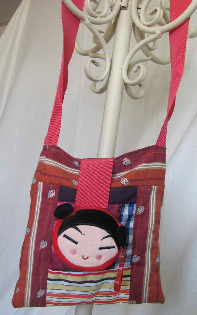 large image of art item: bag – crimson quiltwork with oriental girl motif