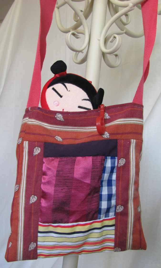 large image of art item: bag – crimson quiltwork with oriental girl motif
