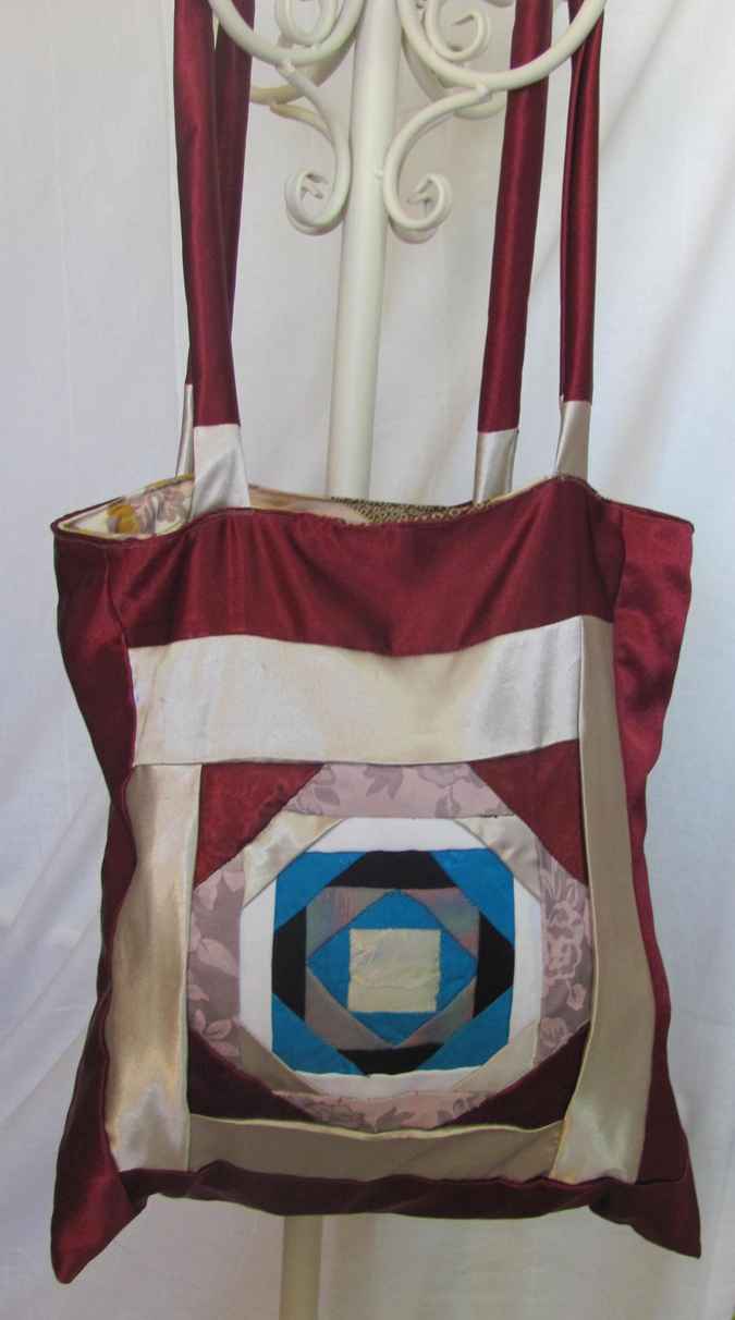 large image of art item: bag – crimson white blue geometric