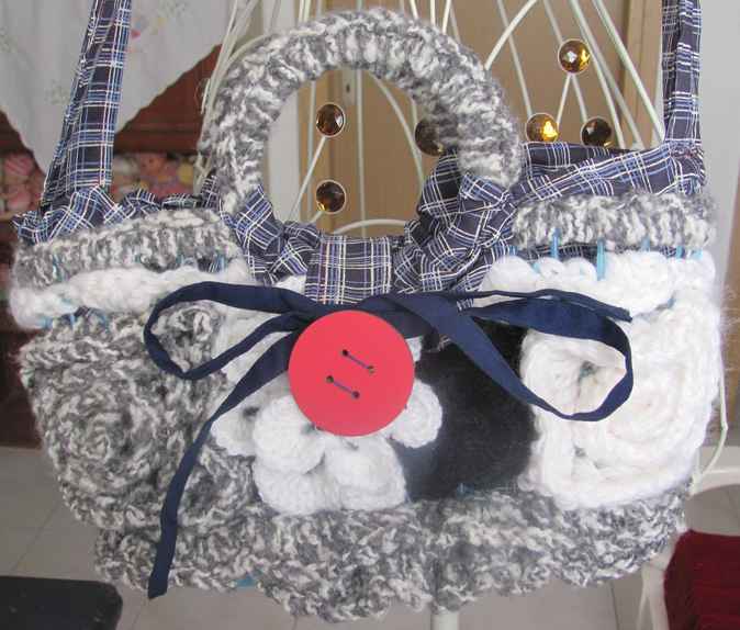 large image of art item: bag – crochet black white button red ribbon