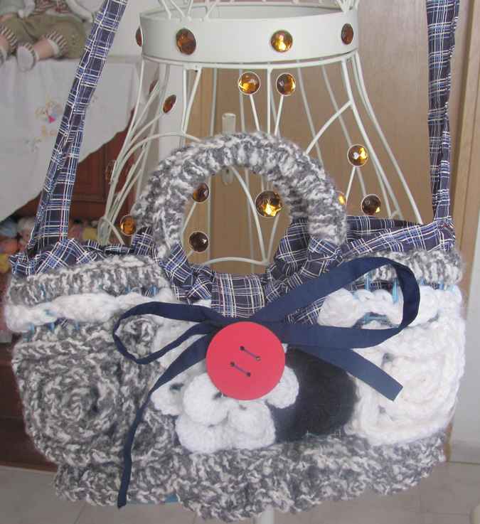 large image of art item: bag – crochet black white button red ribbon