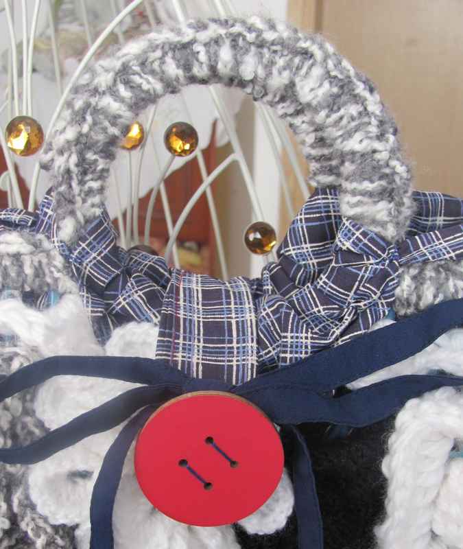 large image of art item: bag – crochet black white button red ribbon