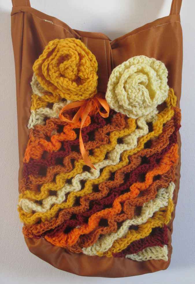 large image of art item: bag – crochet brown yellow orange white flowers and diagonals