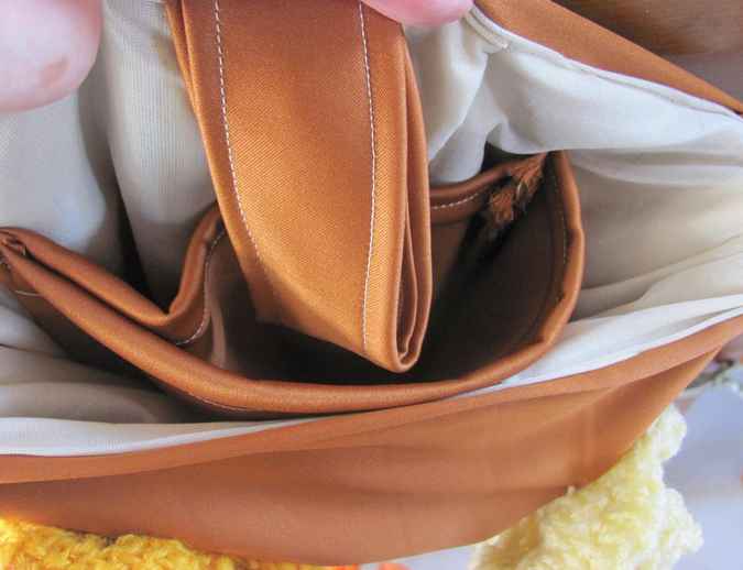 large image of art item: bag – crochet brown yellow orange white flowers and diagonals