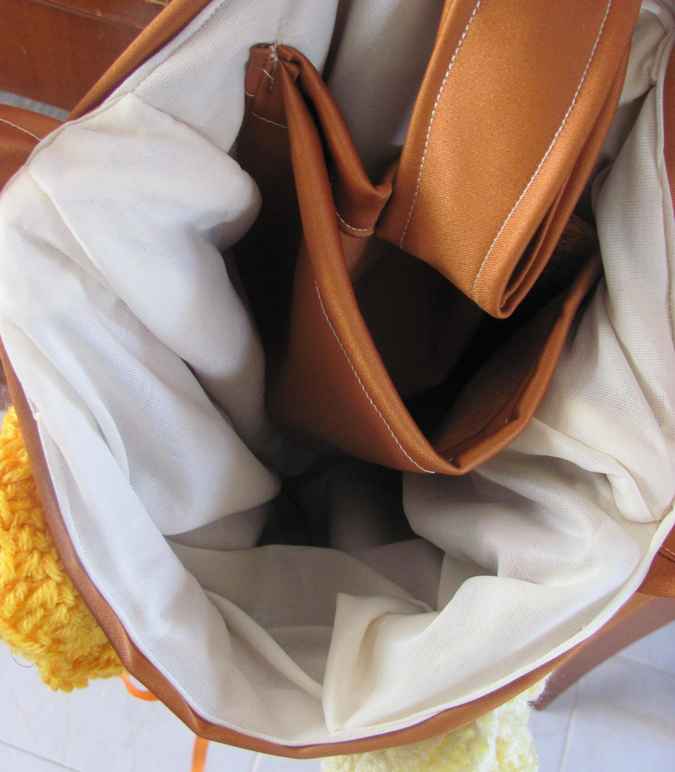 large image of art item: bag – crochet brown yellow orange white flowers and diagonals