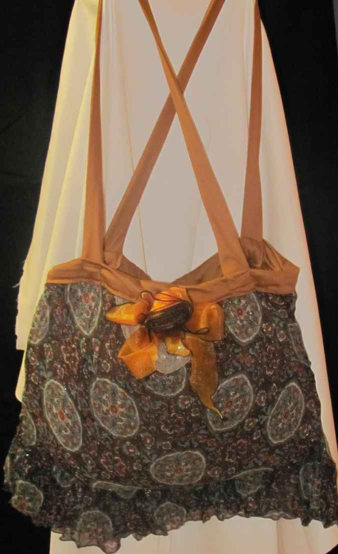large image of art item: bag – flowers circles texture ribbon gold