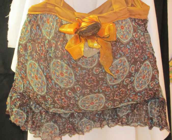 large image of art item: bag – flowers circles texture ribbon gold