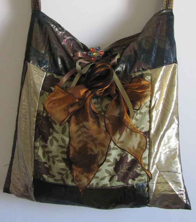 large image of art item: bag – gold with ribbons