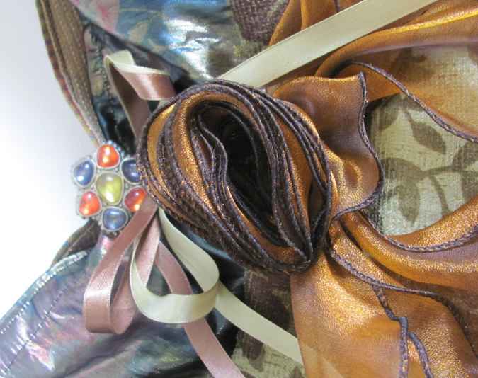 large image of art item: bag – gold with ribbons