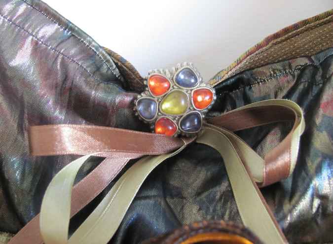 large image of art item: bag – gold with ribbons