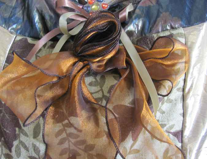large image of art item: bag – gold with ribbons