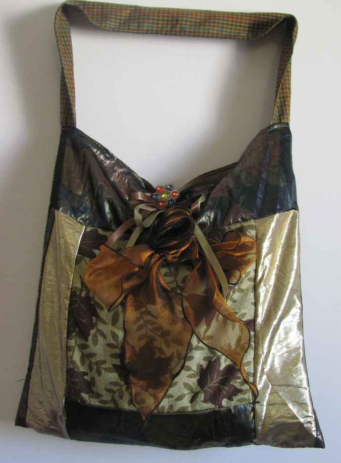 large image of art item: bag – gold with ribbons
