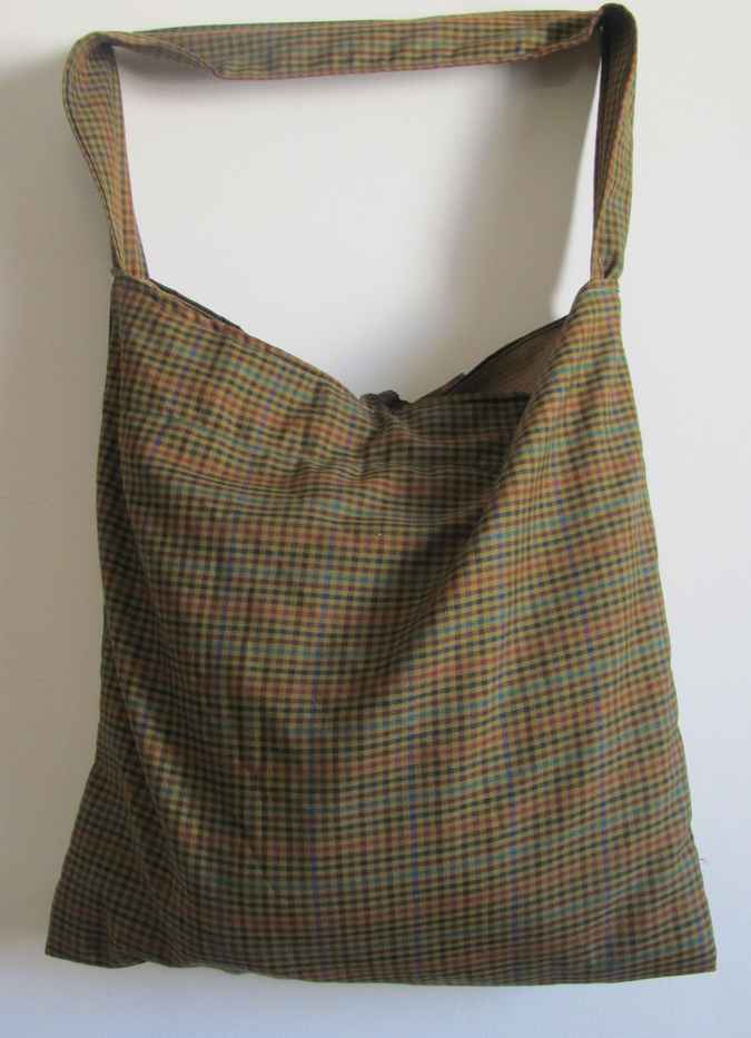 large image of art item: bag – gold with ribbons