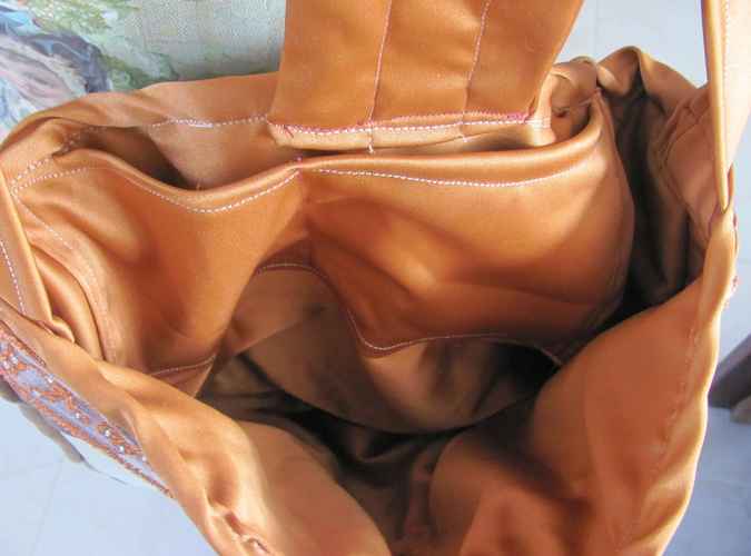 large image of art item: bag – leathery checkred crimson white button gold