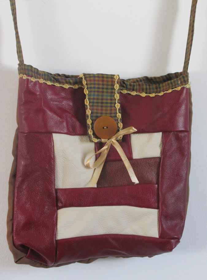 large image of art item: bag – leathery crimson button brown