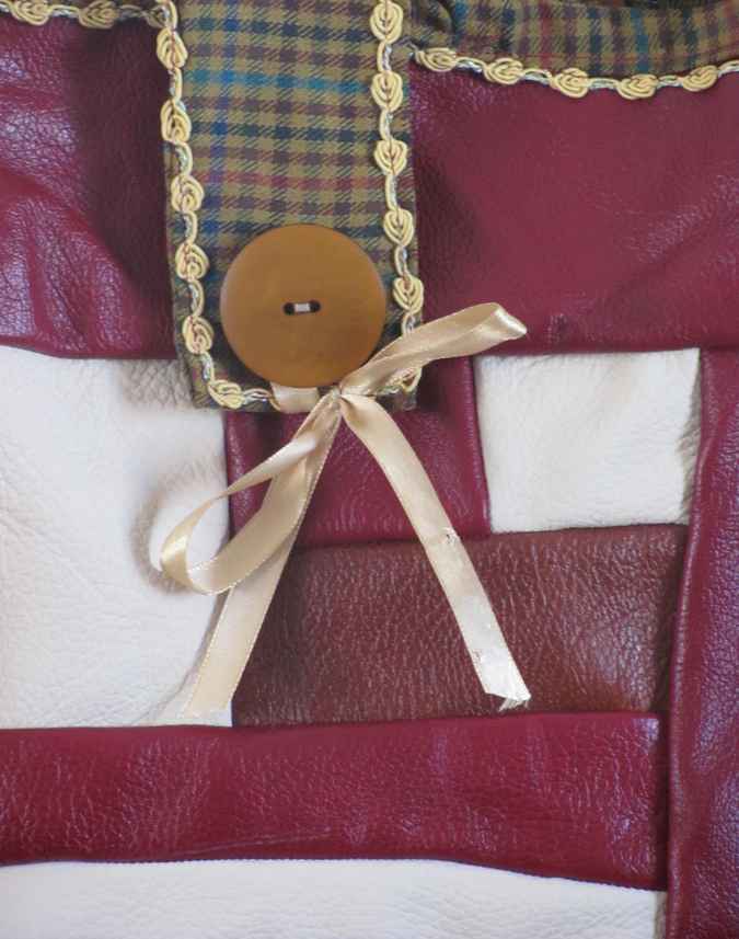 large image of art item: bag – leathery crimson button brown