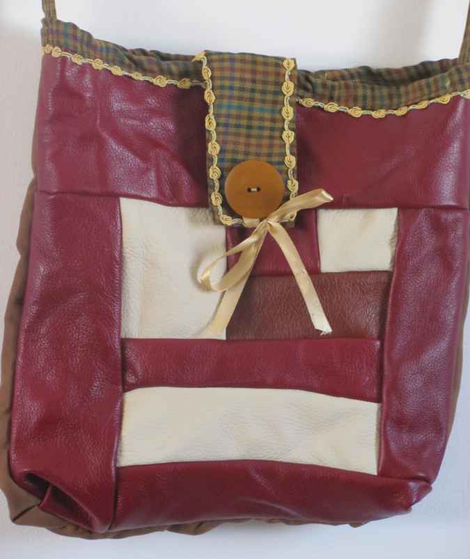 large image of art item: bag – leathery crimson button brown