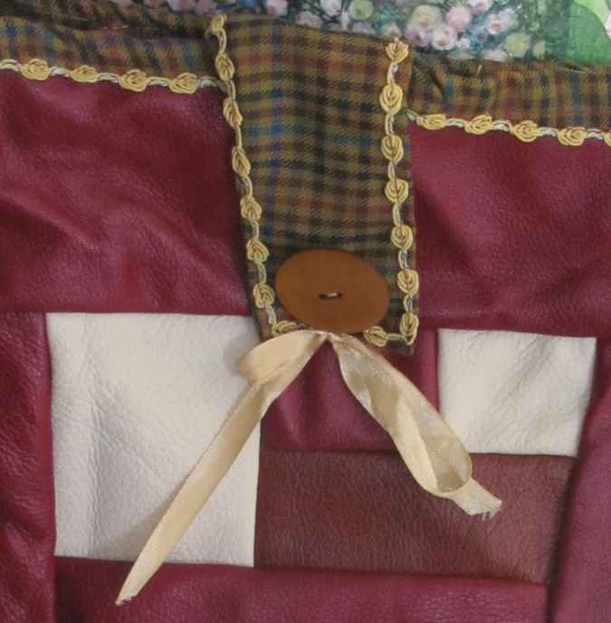 large image of art item: bag – leathery crimson button brown