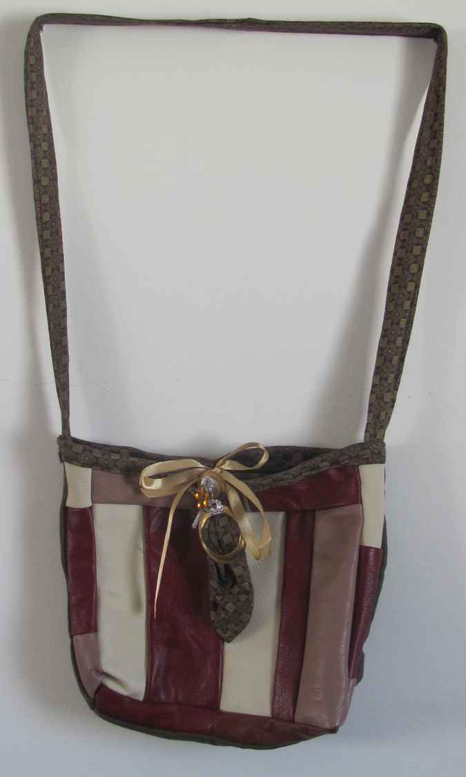 large image of art item: bag – leathery stripes crimson white ribbon