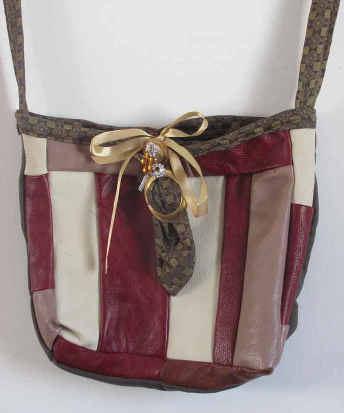 large image of art item: bag – leathery stripes crimson white ribbon
