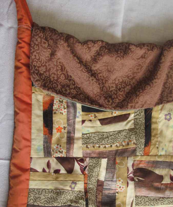 large image of art item: bag – orange brown
