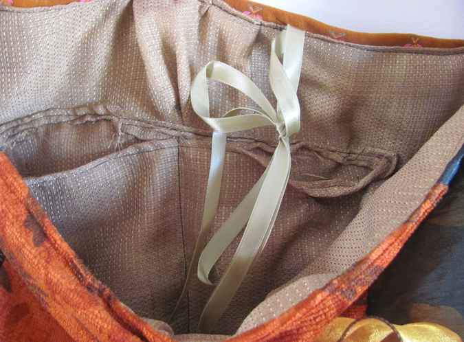 large image of art item: bag – orange with ribbon rose