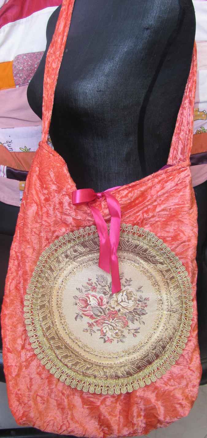 large image of art item: bag – peach quilt brownish disc