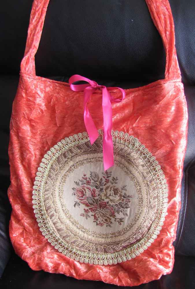 large image of art item: bag – peach quilt brownish disc