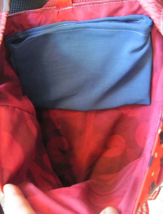 large image of art item: bag – quiltwork red blue with red ribbons