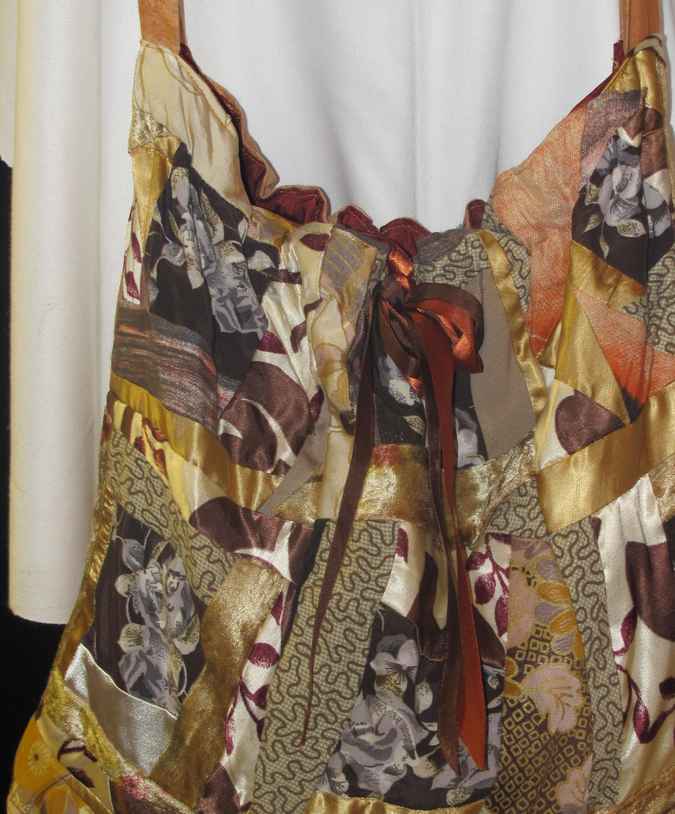 large image of art item: bag – quiltwork shades of brown with ribbon