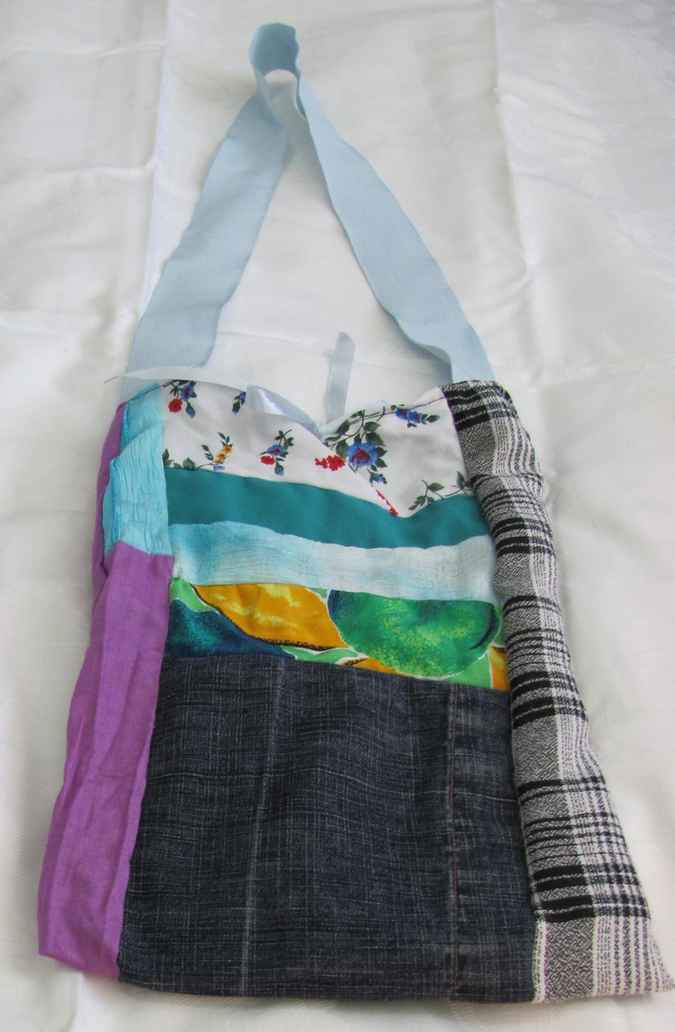 large image of art item: bag – quiltwork turquoise black purple