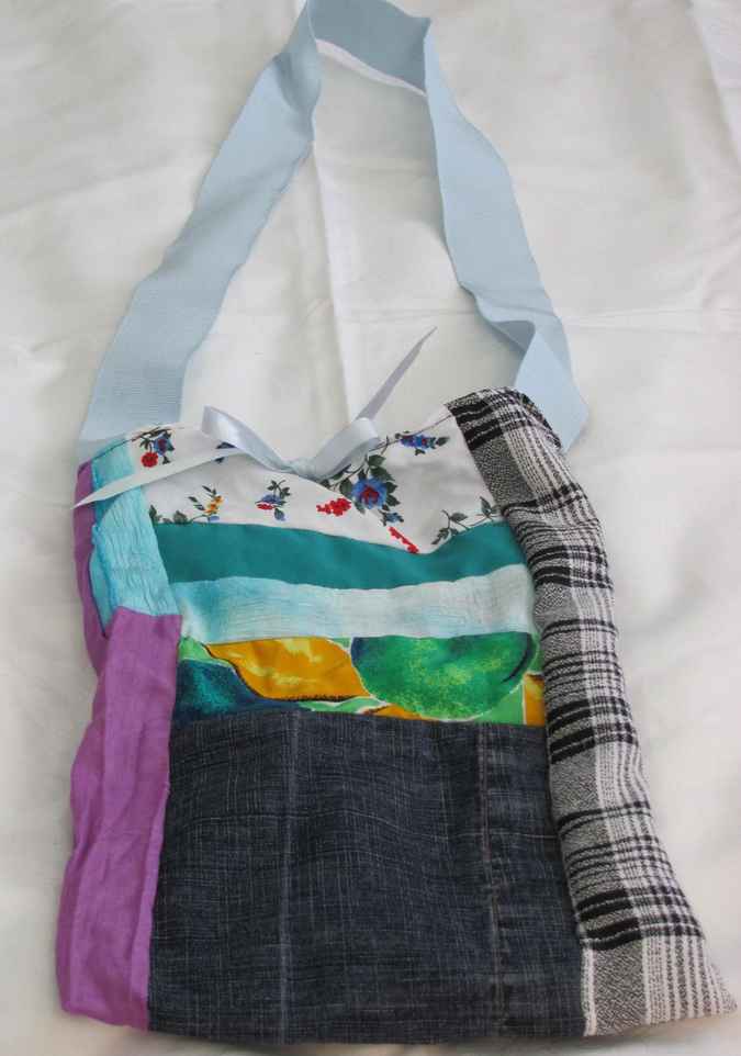 large image of art item: bag – quiltwork turquoise black purple