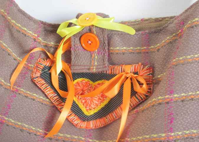 large image of art item: bag – stripes brown orange button ribbon