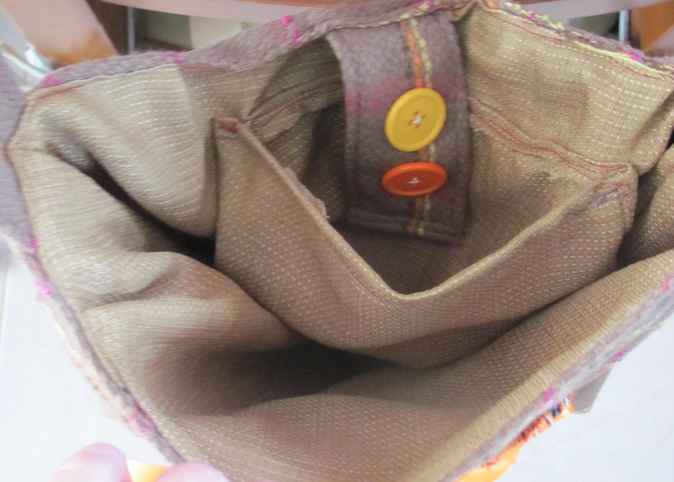 large image of art item: bag – stripes brown orange button ribbon