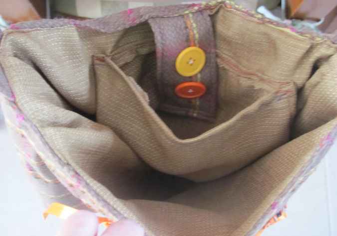 large image of art item: bag – stripes brown orange button ribbon